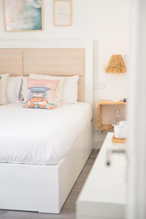 Bedroom detail with natural bedside lighting