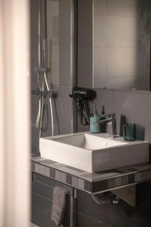 Private bathroom with a walk-in shower